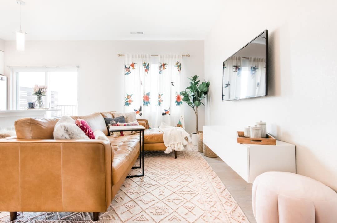 Luxury Home Decor Article Sven sectional with chaise arranged in a small apartment living room.