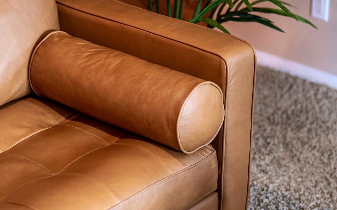 Luxury Home Decor Close-up of the Article Sven sofa’s tufted bench cushion and stitching detail.