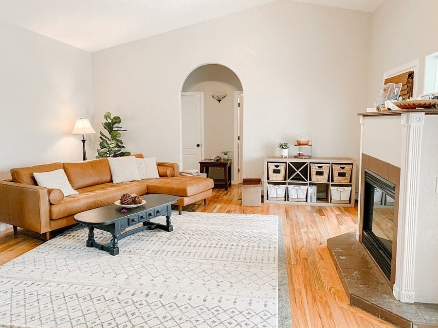 Luxury Home Decor Walnut legs and frame corner detail of a mid-century sofa similar to the Article Sven.